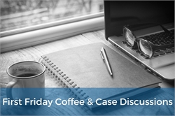 [ai] A coffee cup and an open notebook with a pen placed on a wooden table beside a laptop and a pair of glasses, illuminated by natural light from a window. A blue banner at the bottom displays 'First Friday Coffee & Case Discussions.'